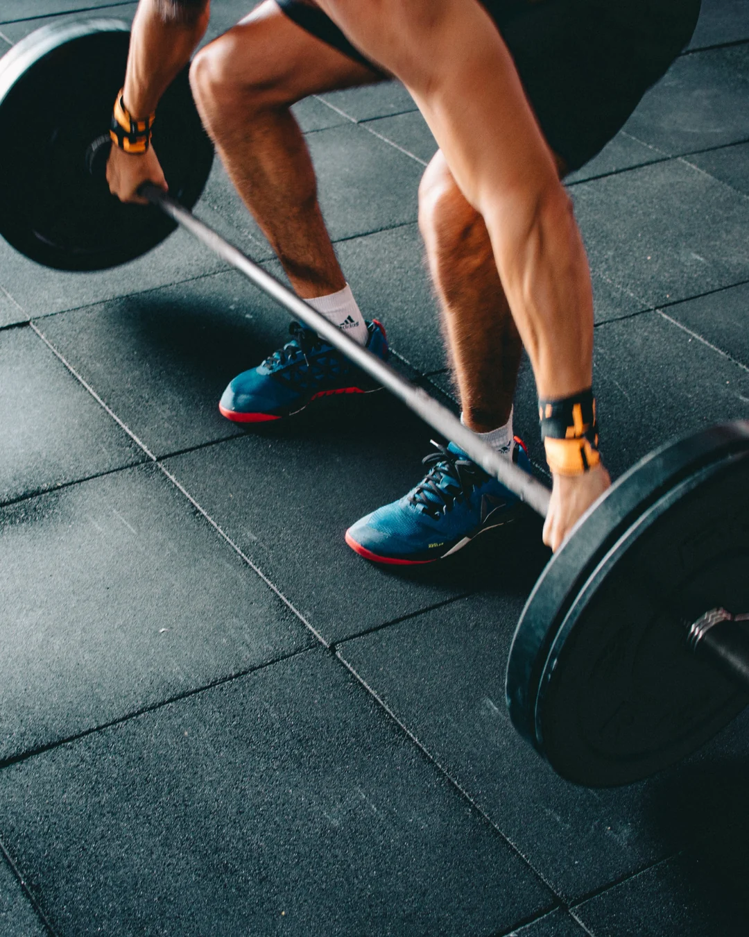 An athlete preparing for a strength movement